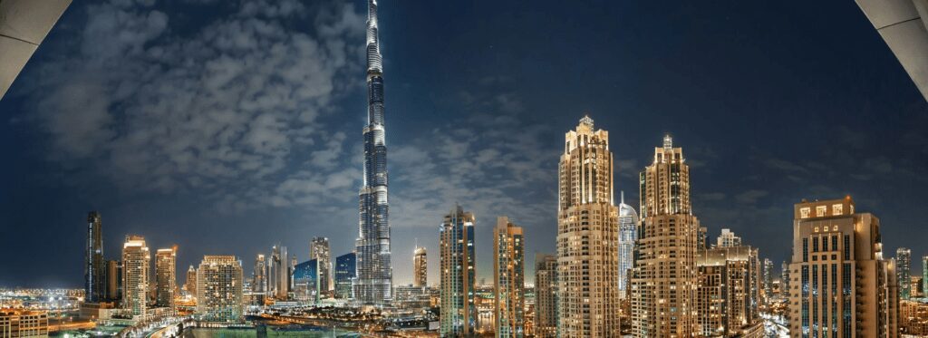 Stunning view of Downtown Dubai featuring iconic landmarks like the Burj Khalifa and Dubai Mall, showcasing the vibrant heart of the city.